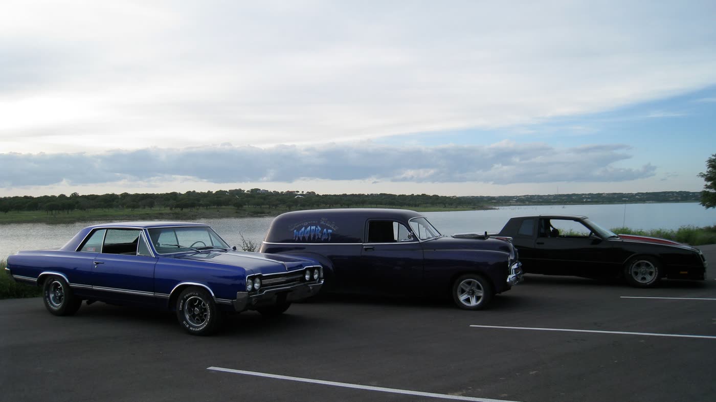 Finished classic cars by the lake
